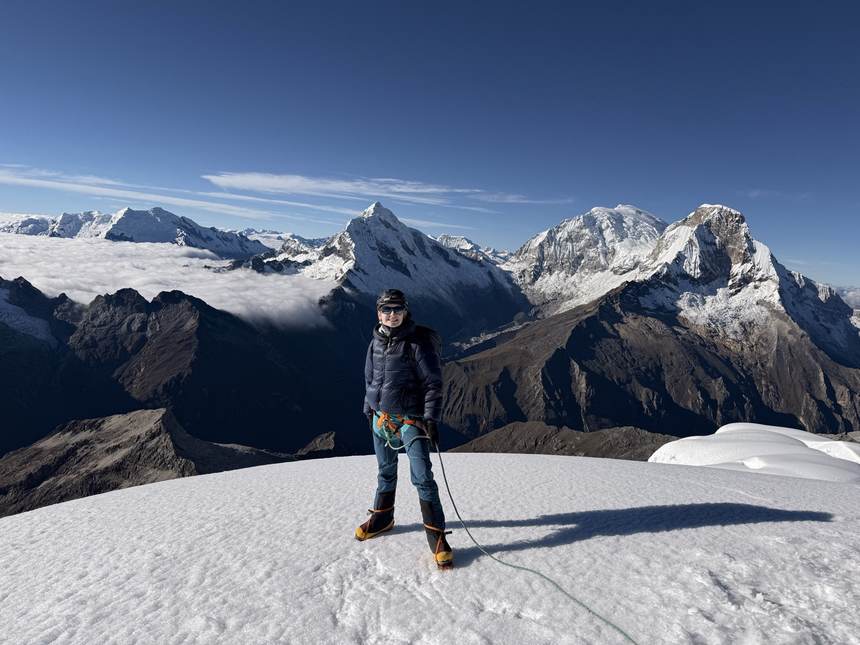 Shea McCrary on a summit in full alpine kit, Cordillera Blanca, Peru
